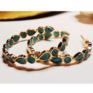 Sterling silver gold color plated hoops.